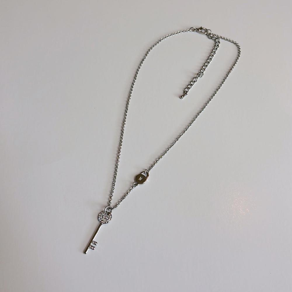 Silver key and lock necklace